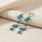 Adorá Dangling Rose Earrings